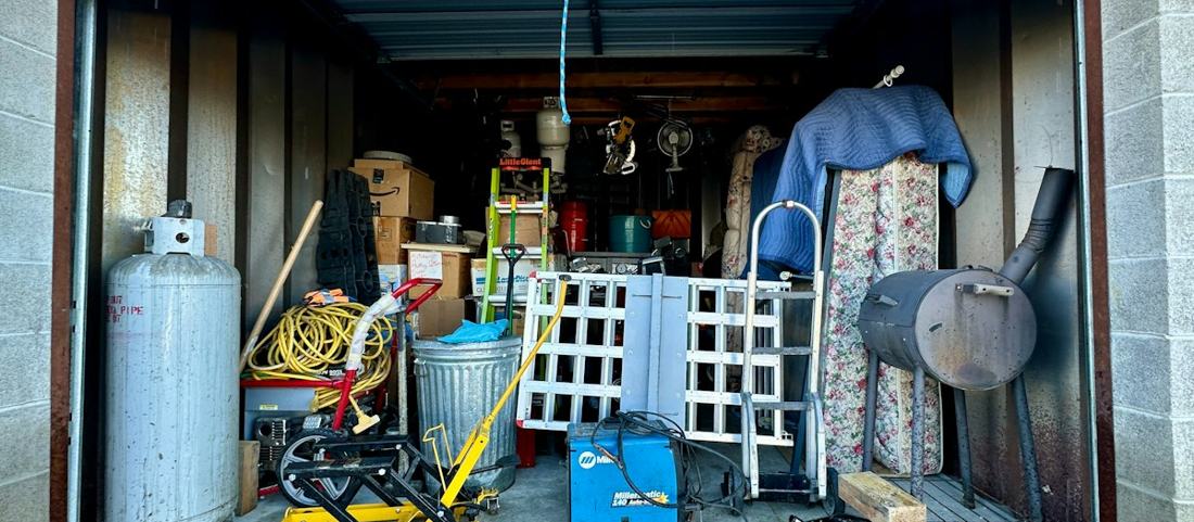 A garage full of clutter before a clean-out